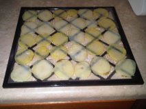 raw potatoes on tray